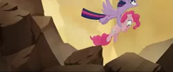 Size: 853x358 | Tagged: safe, derpibooru import, screencap, pinkie pie, twilight sparkle, twilight sparkle (alicorn), alicorn, earth pony, pony, my little pony: the movie, carrying, female, flying, looking down, looking up, rescue, rock, saved, scared