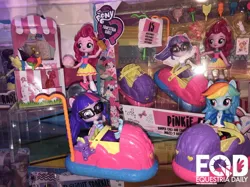 Size: 1210x907 | Tagged: safe, derpibooru import, pinkie pie, rainbow dash, sci-twi, spike, twilight sparkle, equestria girls, equestria girls series, rollercoaster of friendship, bumper cars, candy, clothes, doll, equestria girls logo, equestria girls minis, fair, food, glasses, skirt, toy, toy fair, toy fair 2018
