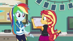 Size: 1920x1080 | Tagged: safe, derpibooru import, screencap, rainbow dash, sunset shimmer, equestria girls, equestria girls series, forgotten friendship, ass, bunset shimmer, canterlot high, classroom, clothes, computer, computer mouse, discovery family logo, duo, duo female, female, geode of super speed, jacket, magical geodes, monitor