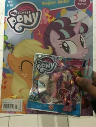 Size: 3024x4032 | Tagged: applejack, derpibooru import, figurine, irl, magazine, photo, safe, spoiler:comic, starlight glimmer, sugar belle, swedish