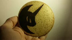 Size: 3264x1836 | Tagged: artist:aracage, coaster, craft, derpibooru import, hand, irl, looking at you, nightmare moon, photo, pyrography, safe, solo, traditional art, wood, woodwork