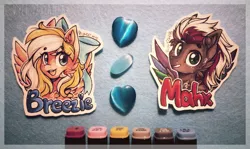 Size: 3353x1997 | Tagged: safe, artist:tenebristayga, derpibooru import, oc, oc:bay breeze, oc:mahx, unofficial characters only, pegasus, pony, babscon, badge, bow, colored wings, con badge, copic, couple, cute, cutout, hair bow, happy, multicolored wings, photo, rainbow wings, traditional art