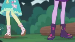 Size: 2208x1242 | Tagged: safe, derpibooru import, screencap, fluttershy, sci-twi, twilight sparkle, butterfly, equestria girls, equestria girls series, stressed in show, stressed in show: fluttershy, boots, clothes, legs, log, pictures of legs, raised leg, shoes, skirt