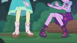 Size: 2208x1242 | Tagged: safe, derpibooru import, screencap, fluttershy, sci-twi, twilight sparkle, butterfly, equestria girls, equestria girls series, stressed in show, stressed in show: fluttershy, boots, bowtie, clothes, legs, log, mud, muddy, pictures of legs, shoes, skirt