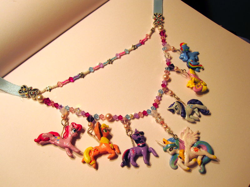 Size: 1632x1224 | Tagged: applejack, artist:manic-and-monstrous, charm, craft, derpibooru import, fluttershy, irl, jewelry, mane six, necklace, photo, pinkie pie, princess celestia, rainbow dash, rarity, safe, sculpey, twilight sparkle