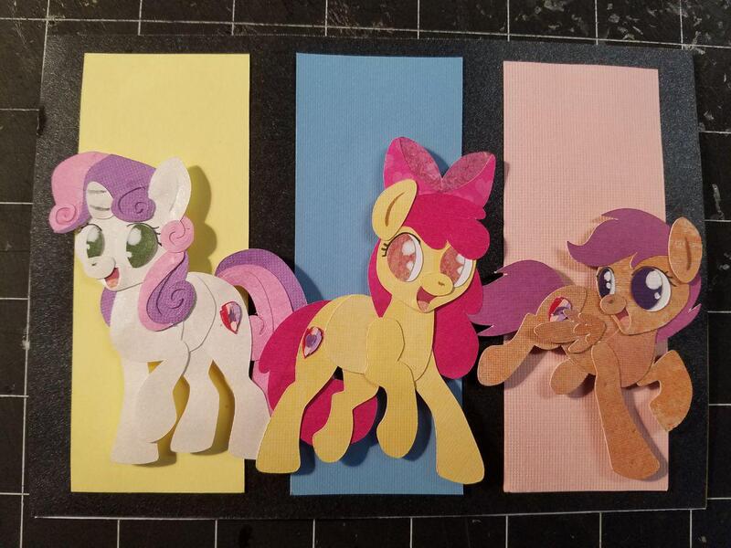 Size: 1280x960 | Tagged: safe, artist:sparkynekomi, derpibooru import, apple bloom, scootaloo, sweetie belle, earth pony, pegasus, pony, unicorn, craft, cutie mark crusaders, female, filly, irl, papercraft, photo, smiling, traditional art, trio