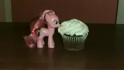 Size: 4288x2416 | Tagged: cupcake, derpibooru import, desk, door, food, frosting, irl, photo, pinkie pie, safe, solo, toy