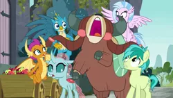 Size: 1280x720 | Tagged: safe, derpibooru import, screencap, gallus, ocellus, sandbar, silverstream, smolder, yona, changedling, changeling, classical hippogriff, dragon, earth pony, gryphon, hippogriff, pony, yak, school daze, castle of the royal pony sisters, cloven hooves, dragoness, female, flying, male, student six, teenager
