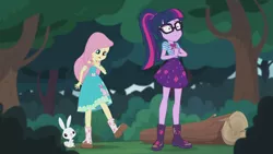 Size: 2208x1242 | Tagged: safe, derpibooru import, screencap, angel bunny, fluttershy, sci-twi, twilight sparkle, butterfly, equestria girls, equestria girls series, stressed in show, stressed in show: fluttershy, boots, bowtie, clothes, dress, geode of telekinesis, glasses, log, looking down, magical geodes, mud, muddy, open mouth, ponytail, raised leg, sad, shoes, skirt, smiling, tree