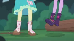 Size: 2208x1242 | Tagged: safe, derpibooru import, screencap, fluttershy, sci-twi, twilight sparkle, butterfly, equestria girls, equestria girls series, stressed in show, stressed in show: fluttershy, boots, clothes, dress, jumping, legs, log, mud, muddy, pictures of legs, shoes