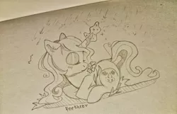 Size: 1280x825 | Tagged: safe, artist:feekteev, derpibooru import, fleur-de-lis, pony, flower, magic, monochrome, prone, rain, solo, traditional art