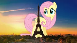 Size: 2560x1440 | Tagged: safe, artist:dashiesparkle, artist:theotterpony, derpibooru import, fluttershy, pegasus, pony, eiffel tower, female, france, giant pony, highrise ponies, irl, macro, mare, paris, photo, ponies in real life, solo, story in the source