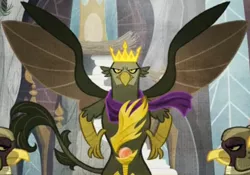 Size: 1108x777 | Tagged: safe, derpibooru import, screencap, king grover, gryphon, the lost treasure of griffonstone, clothes, cropped, crown, crown of grover, history of griffonstone, idol of boreas, jewelry, looking at you, male, regalia, scarf, solo, solo focus, spread wings, wings