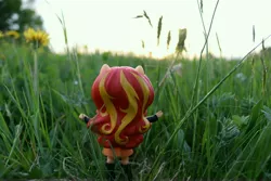 Size: 6000x4000 | Tagged: safe, artist:artofmagicpoland, derpibooru import, sunset shimmer, equestria girls, doll, equestria girls minis, eqventures of the minis, evening, grass, micro, pun, solo, sunset, sunshine shimmer, toy