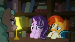 Size: 1920x1080 | Tagged: safe, derpibooru import, screencap, starlight glimmer, sunburst, pony, the parent map, background pony, book, bookshelf, bookstore, hiding, lamp, table