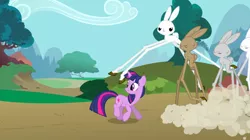 Size: 1440x808 | Tagged: safe, derpibooru import, screencap, angel bunny, twilight sparkle, girabbit, pony, rabbit, unicorn, the return of harmony, angel is a bunny bastard, bunny stampede, dust cloud, female, imminent pain, leaping, mare, stampede, this will end in pain, unicorn twilight