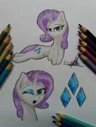 Size: 3096x4128 | Tagged: safe, artist:ironbeastz, derpibooru import, rarity, pony, bust, one eye closed, pencil, portrait, prone, solo, traditional art, wink