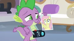 Size: 1920x1080 | Tagged: safe, derpibooru import, screencap, fluttershy, spike, dragon, pegasus, pony, non-compete clause, camera, discovery family logo, faic, female, male, mare, out of context, photo, red eye, smiling, spike's photo