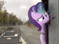 Size: 2048x1536 | Tagged: safe, artist:naijiwizard, derpibooru import, starlight glimmer, pony, australia, dim, irl, looking at you, melbourne, photo, photoshop, ponies in real life, solo, suspicious, tram