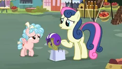 Size: 1600x900 | Tagged: safe, derpibooru import, screencap, bon bon, cozy glow, sweetie drops, earth pony, pegasus, pony, marks for effort, cactus, duo, female, filly, helmet, mare, raised hoof, shopping bags