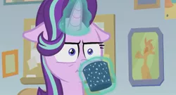 Size: 811x439 | Tagged: safe, derpibooru import, screencap, starlight glimmer, pony, unicorn, marks for effort, :i, cup, empathy cocoa, faic, floppy ears, glowing horn, i mean i see, reaction image, solo, unamused