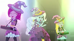 Size: 1920x1080 | Tagged: safe, derpibooru import, screencap, fuchsia blush, lavender lace, trixie, equestria girls, rainbow rocks, clothes, female, hat, microphone, singing, song, stage, tricks up my sleeve, trio, trio female, trixie and the illusions, trixie's hat