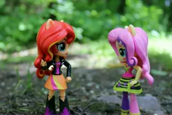 Size: 6000x4000 | Tagged: safe, artist:artofmagicpoland, derpibooru import, fluttershy, sunset shimmer, equestria girls, rainbow rocks, clothes, doll, equestria girls minis, jacket, leather jacket, looking at each other, pointing, toy