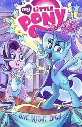 Size: 1325x2048 | Tagged: safe, artist:sophieascruggs, derpibooru import, idw, starlight glimmer, trixie, pony, unicorn, spoiler:comic, spoiler:comic69, assistant, cape, clothes, comic cover, cover, duo, female, hat, leotard, magic show, shipping fuel, stage, trixie's cape, trixie's hat, wand