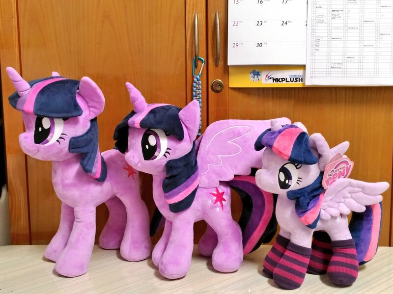 Size: 1024x767 | Tagged: safe, artist:nekokevin, derpibooru import, twilight sparkle, twilight sparkle (alicorn), alicorn, unicorn, 4de, calendar, clothes, female, irl, mare, multeity, photo, plushie, self ponidox, size difference, smiling, socks, sparkle sparkle sparkle, spread wings, starlight's little twibird, striped socks, triality, unicorn twilight, wings