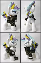 Size: 1024x1572 | Tagged: safe, artist:gingerale2016, derpibooru import, rarity, pony, unicorn, alternate hairstyle, chains, clothes, ear piercing, irl, jacket, leather jacket, lidded eyes, nose piercing, photo, piercing, plushie, punk, raripunk, solo, spiked wristband, wristband