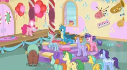 Size: 1916x1047 | Tagged: safe, derpibooru import, screencap, auburn vision, berry blend, berry bliss, citrine spark, fire quacker, gallus, huckleberry, november rain, ocellus, peppermint goldylinks, pinkie pie, scootaloo, yona, changedling, changeling, gryphon, pony, yak, marks for effort, bagpipes, balloon, cupcake, dessert, food, french horn, friendship student, horn, keyboard, musical instrument, school of friendship, tuba
