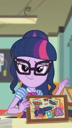 Size: 323x572 | Tagged: safe, derpibooru import, screencap, sci-twi, twilight sparkle, equestria girls, equestria girls series, the last day of school, cropped, dreamworks face, female, geode of telekinesis, glasses, magical geodes, smiling, smuglight sparkle