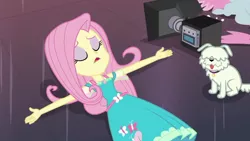 Size: 1280x720 | Tagged: safe, derpibooru import, screencap, fluttershy, dog, equestria girls, equestria girls series, outtakes (episode), camera, clothes, dress, eyes closed, eyeshadow, lying, makeup, pup-pup