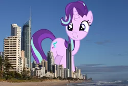 Size: 5572x3744 | Tagged: safe, artist:auskeldeo, artist:paganmuffin, derpibooru import, starlight glimmer, pony, unicorn, australia, brisbane, female, giant pony, giant starlight glimmer, gold coast, highrise ponies, irl, macro, mare, photo, ponies in real life, smiling, solo