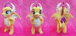 Size: 1023x486 | Tagged: artist:plushypuppy, derpibooru import, dragon, dragoness, female, grin, hand on hip, irl, lidded eyes, photo, plushie, safe, smiling, smolder, solo, standing, wings