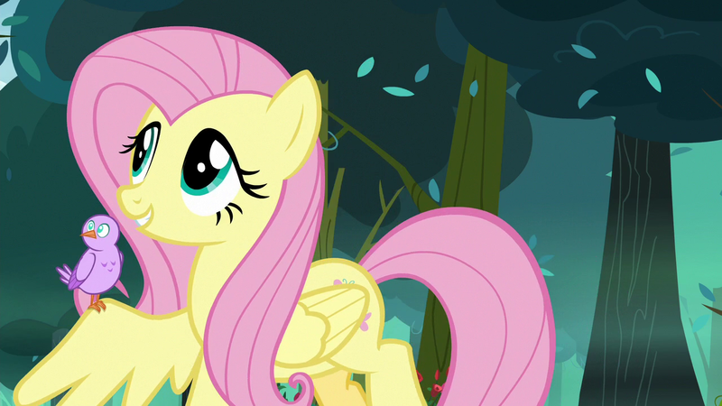 Size: 1280x720 | Tagged: safe, derpibooru import, screencap, fluttershy, bird, pegasus, pony, season 8, the mean 6, chick, cute, female, forest, mare, shyabetes, smiling, spread wings