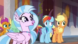 Size: 1280x720 | Tagged: safe, derpibooru import, screencap, applejack, rainbow dash, silverstream, smolder, yona, classical hippogriff, dragon, earth pony, hippogriff, pegasus, pony, yak, season 8, spoiler:s08, admiration, applejack's hat, cheerful, confused, cowboy hat, cute, diastreamies, dragoness, female, frown, horns, jewelry, looking up, mare, multicolored mane, necklace, obscured face, pearl necklace, ponytail, raised eyebrow, school of friendship, skunk stripe, smiling, stetson, talking, teenager