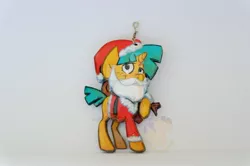 Size: 1024x681 | Tagged: safe, artist:king-franchesco, derpibooru import, snails, pony, unicorn, beard, christmas, clothes, colt, costume, facial hair, foal, hat, holiday, hooves, horn, irl, keychain, male, photo, santa costume, santa hat, solo, watermark