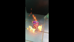Size: 480x270 | Tagged: semi-grimdark, derpibooru import, starlight glimmer, abuse, animated, burning, cutie mark crew, downvote bait, fire, flame thrower, flamethrower, glimmerbuse, irl, mcdonald's happy meal toys, merchandise, op is a spychecking pyro, photo, running, sound, spychecking, toy, toy abuse, video, weapon, webm