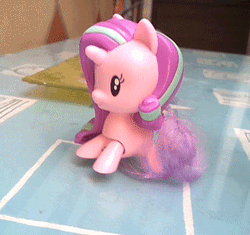 Size: 300x282 | Tagged: safe, derpibooru import, starlight glimmer, pony, unicorn, animated, cute, cutie mark crew, female, gif, glim glam, glimmerbetes, irl, magical horse, majestic as fuck, mare, mcdonald's, mcdonald's happy meal toys, nightmare fuel, photo, slow motion, toy
