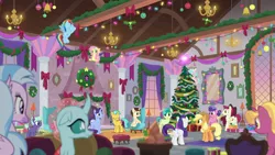 Size: 1920x1080 | Tagged: safe, derpibooru import, screencap, applejack, berry blend, berry bliss, citrine spark, cozy glow, dawnlighter, fire quacker, fluttershy, november rain, ocellus, rainbow dash, rarity, sandbar, silverstream, sugar maple, pony, the hearth's warming club, christmas, christmas tree, fire of friendship, friendship student, hearth's warming tree, holiday, tree