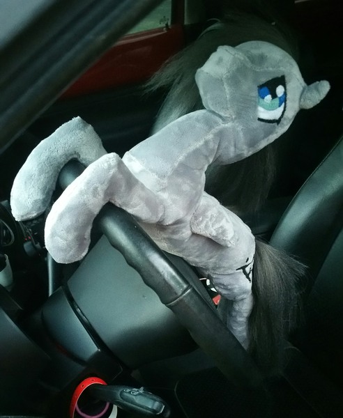 Size: 1827x2228 | Tagged: artist:gleamydreams, derpibooru import, driving, irl, minky, oc, oc:helicity, photo, plushie, safe, solo