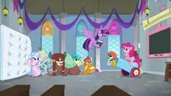 Size: 1280x720 | Tagged: safe, derpibooru import, screencap, gallus, ocellus, pinkie pie, sandbar, silverstream, smolder, twilight sparkle, twilight sparkle (alicorn), yona, alicorn, changedling, changeling, classical hippogriff, dragon, gryphon, hippogriff, pony, yak, school daze, book, covering ears, dragoness, female, flying, party cannon, school of friendship, student six