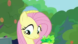 Size: 1280x720 | Tagged: safe, derpibooru import, screencap, fluttershy, pegasus, pony, fake it 'til you make it, female, food, lettuce, mare, solo