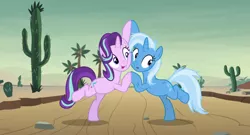 Size: 1733x934 | Tagged: safe, derpibooru import, screencap, starlight glimmer, trixie, pony, unicorn, road to friendship, bipedal, cactus, cheek squish, cheek to cheek, cute, desert, diatrixes, duo, duo female, female, glimmerbetes, mare, messy mane, saguaro cactus, squishy cheeks