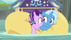 Size: 1280x720 | Tagged: safe, derpibooru import, screencap, starlight glimmer, trixie, pony, unicorn, road to friendship, cheek squish, cheek to cheek, cute, diatrixes, duo, duo female, eye contact, female, friendshipping, ghastly gorge, glimmerbetes, i guess we're stuck together, inflatable, inflatable raft, looking at each other, mare, prone, raft, river, shipping fuel, smiling, snuggling, squished, squishy, squishy cheeks, trixie's wagon, water, we're friendship bound