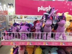 Size: 960x720 | Tagged: safe, derpibooru import, photographer:charleschiamchuangchao, applejack, rarity, twilight sparkle, irl, malaysia, multeity, my little pony logo, photo, plushie, sparkle sparkle sparkle, starry eyes, toys r us, wingding eyes