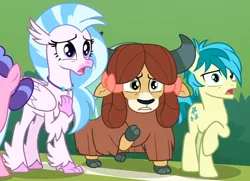Size: 940x679 | Tagged: safe, derpibooru import, screencap, sandbar, silverstream, yona, classical hippogriff, earth pony, hippogriff, pony, yak, a matter of principals, bow, cloven hooves, female, hair bow, jewelry, male, monkey swings, necklace, raised hoof, shocked, teenager, trio