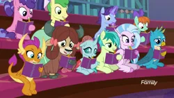 Size: 1920x1080 | Tagged: safe, derpibooru import, screencap, berry blend, berry bliss, gallus, huckleberry, november rain, ocellus, peppermint goldylinks, sandbar, silverstream, smolder, yona, changedling, changeling, classical hippogriff, dragon, earth pony, gryphon, hippogriff, pony, yak, the end in friend, bow, cloven hooves, dragoness, female, friendship student, glowing horn, hair bow, jewelry, magic, male, mare, monkey swings, mouth hold, necklace, notebook, notepad, pencil, stallion, student, student six, teenager, telekinesis, writing
