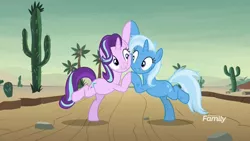 Size: 1920x1080 | Tagged: safe, derpibooru import, screencap, starlight glimmer, trixie, pony, unicorn, road to friendship, balancing, bipedal, cactus, cheek squish, cute, desert, diatrixes, discovery family logo, duo, duo female, eye contact, female, friendship chant, glimmerbetes, holding hooves, injured, looking at each other, mare, messy mane, saguaro cactus, squishy cheeks